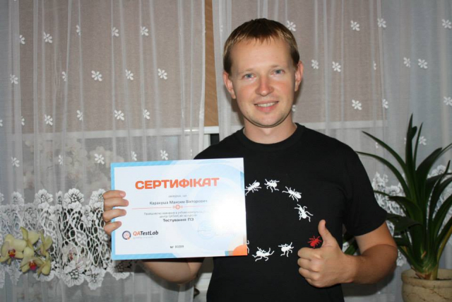 QATestLab training graduate with certificate